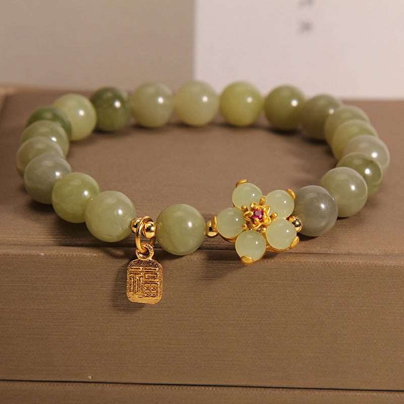 Bracelet porte-bonheur en jade vert avec fleur de 14 à 16 cm