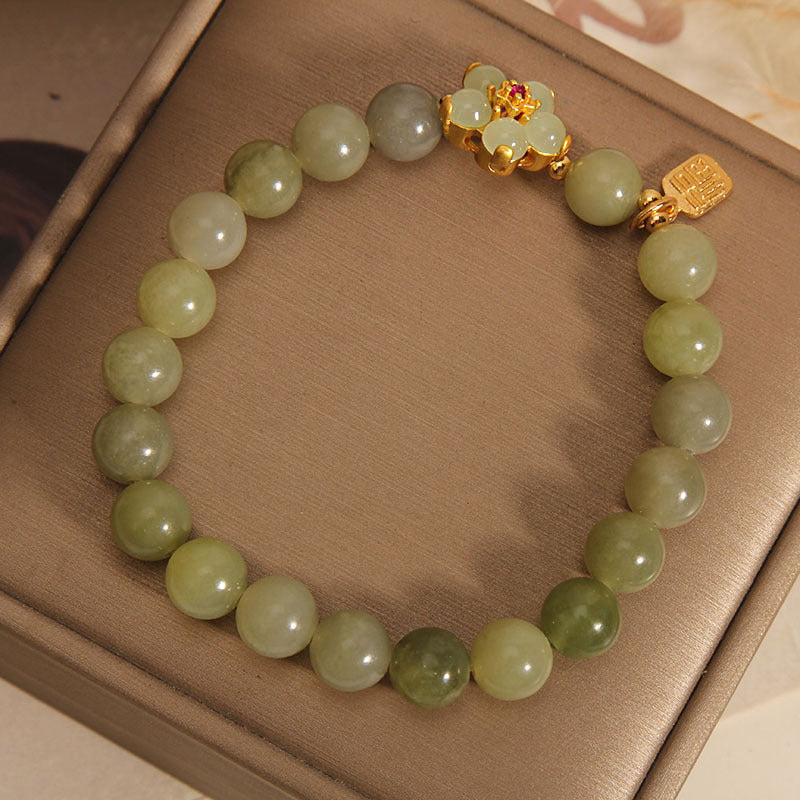 Bracelet porte-bonheur en jade vert avec fleur de 14 à 16 cm
