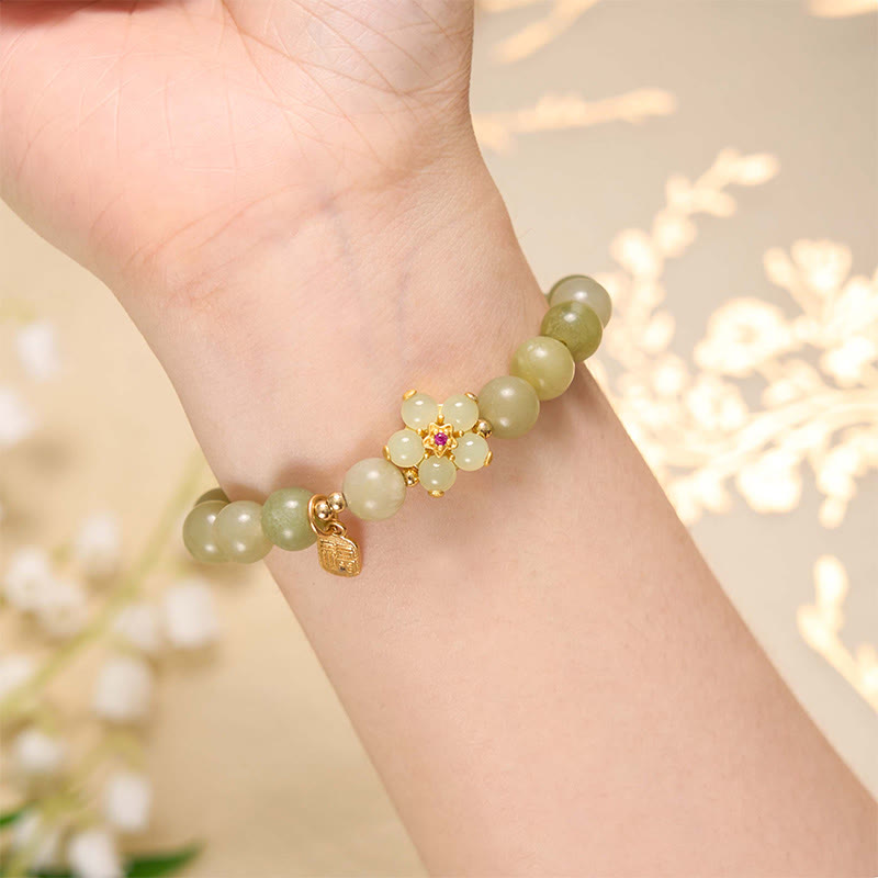 Bracelet porte-bonheur en jade vert avec fleur de 14 à 16 cm