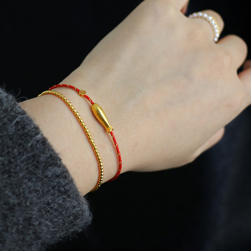 Bracelet tressé plaqué or 14 carats avec poisson koï et porte-bonheur