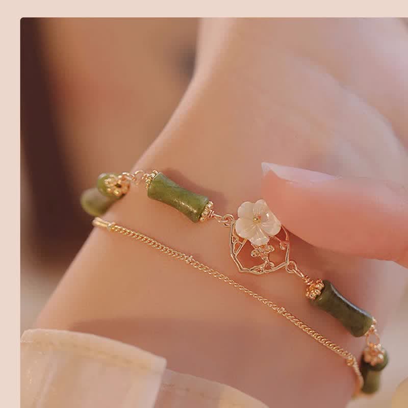 Bracelet spirituel en péridot plaqué or 14 carats avec fleur de bambou