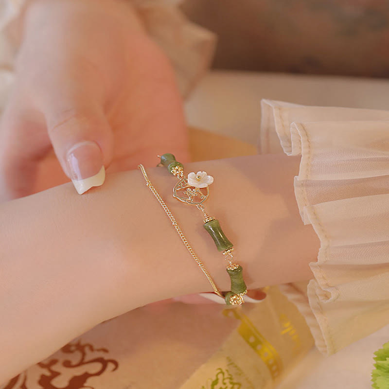 Bracelet spirituel en péridot plaqué or 14 carats avec fleur de bambou