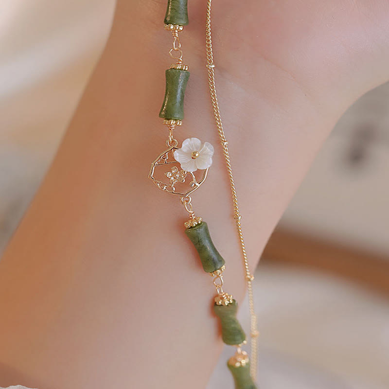 Bracelet spirituel en péridot plaqué or 14 carats avec fleur de bambou