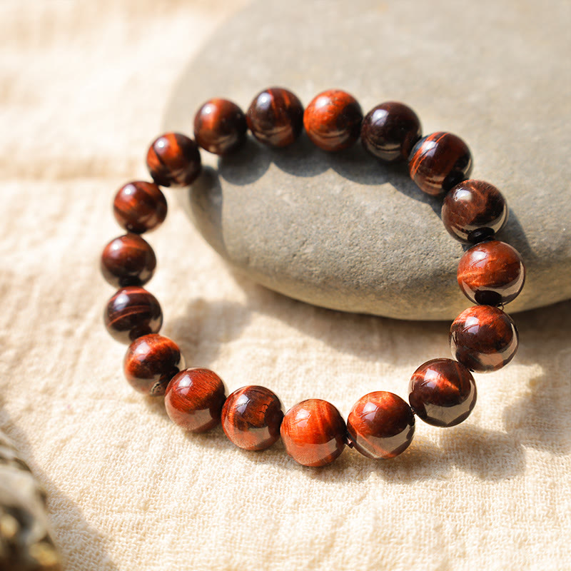 Bracelet de guérison en œil de tigre de 14 mm pour la protection et le courage
