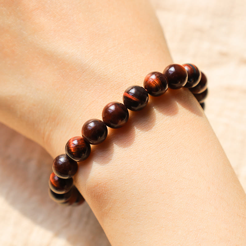 Bracelet de guérison en œil de tigre de 14 mm pour la protection et le courage