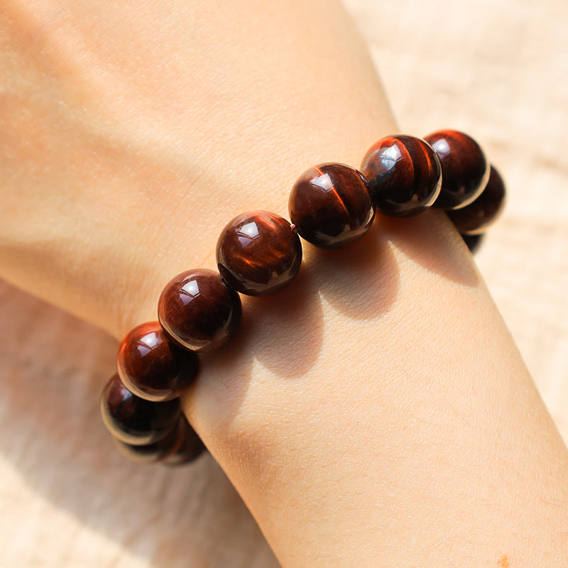Bracelet de guérison en œil de tigre de 14 mm pour la protection et le courage