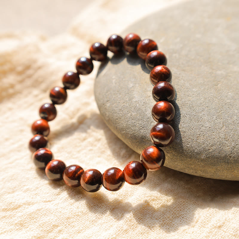 Bracelet de guérison en œil de tigre de 14 mm pour la protection et le courage