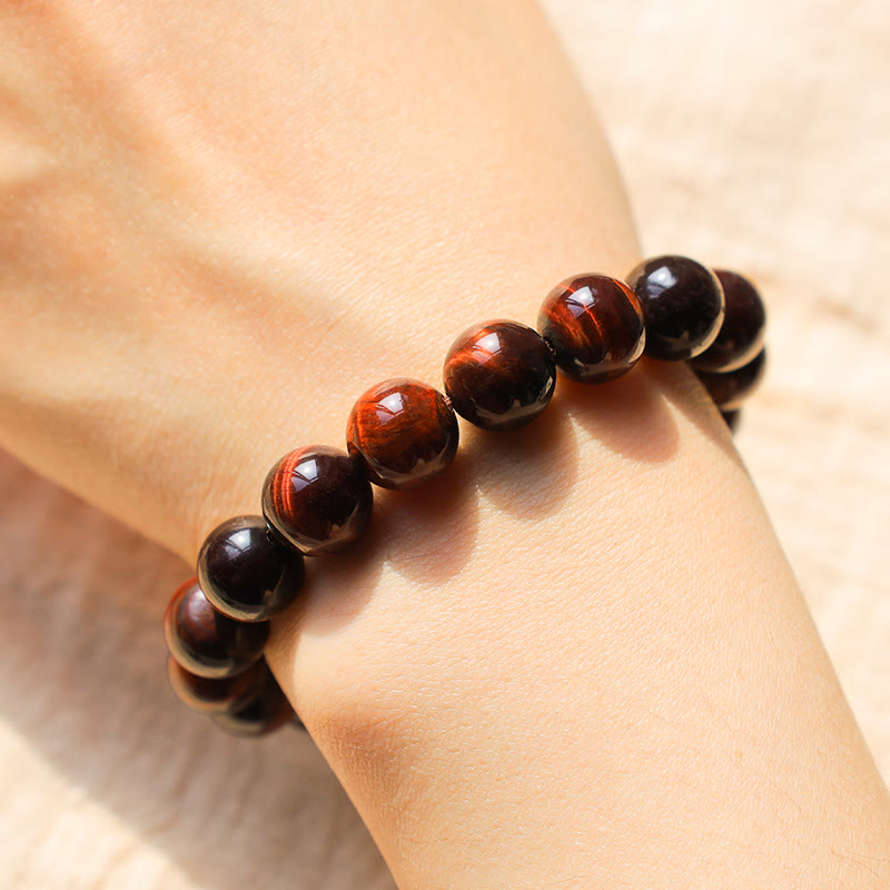 Bracelet de guérison en œil de tigre de 14 mm pour la protection et le courage