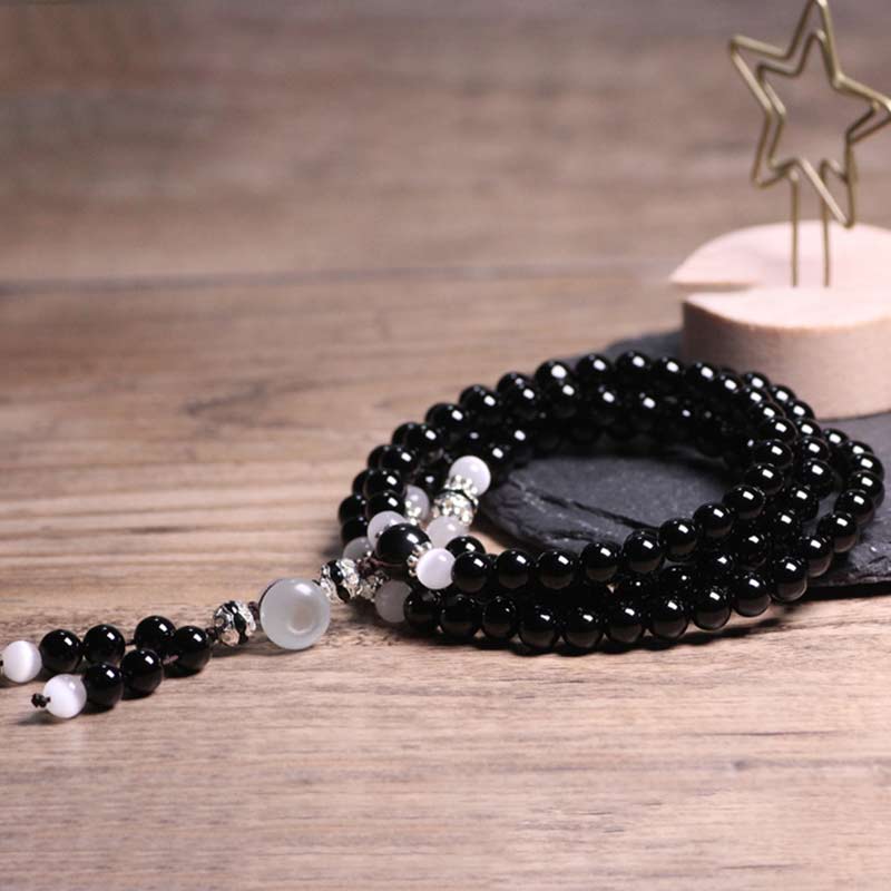 Bracelet de méditation en onyx noir et quartz clair de 6 mm