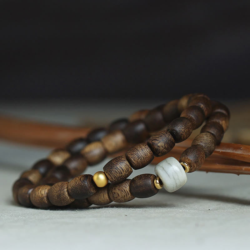 Bracelet spirituel double tour en bois d'agar et or 999 de 15 cm