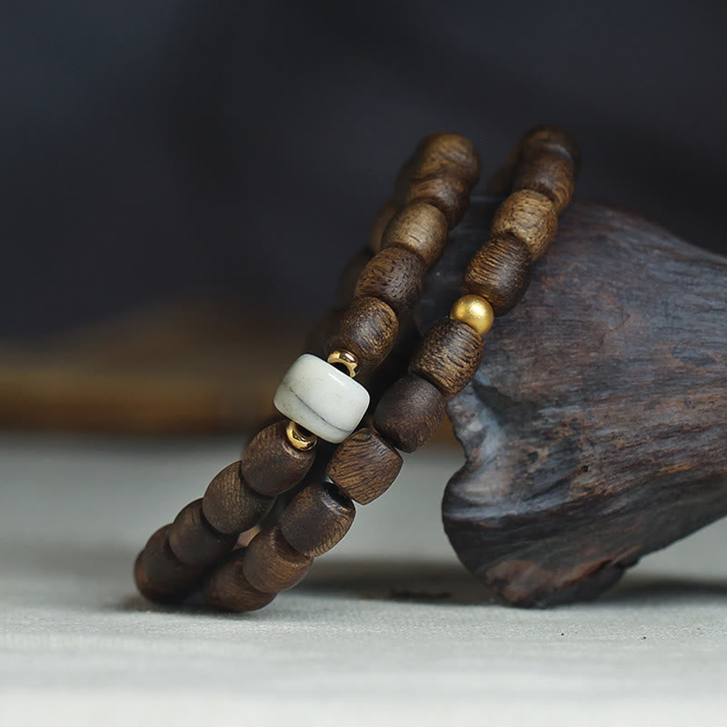 Bracelet spirituel double tour en bois d'agar et or 999 de 15 cm
