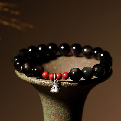 Bracelet de force avec breloque lotus en obsidienne noire de 8 mm