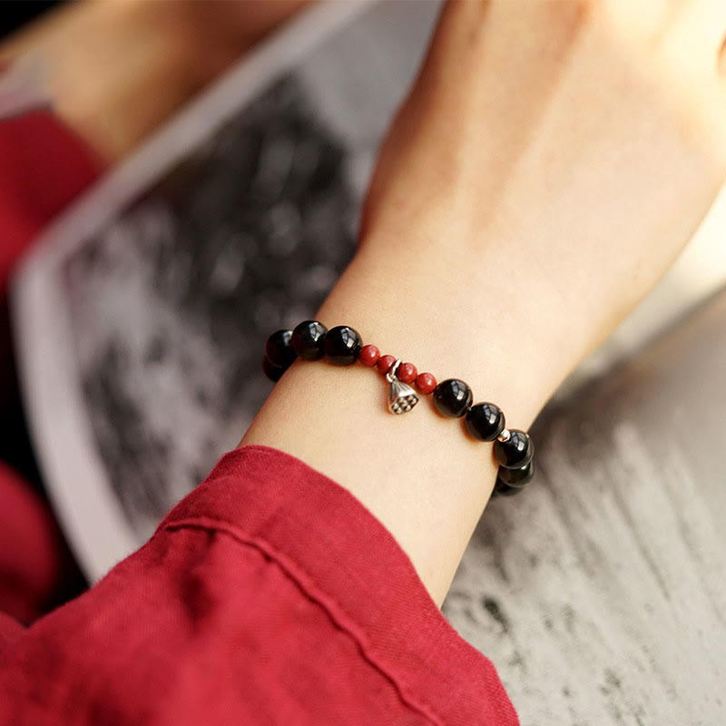 8mm Black Obsidian Lotus Charm Strength Bracelet