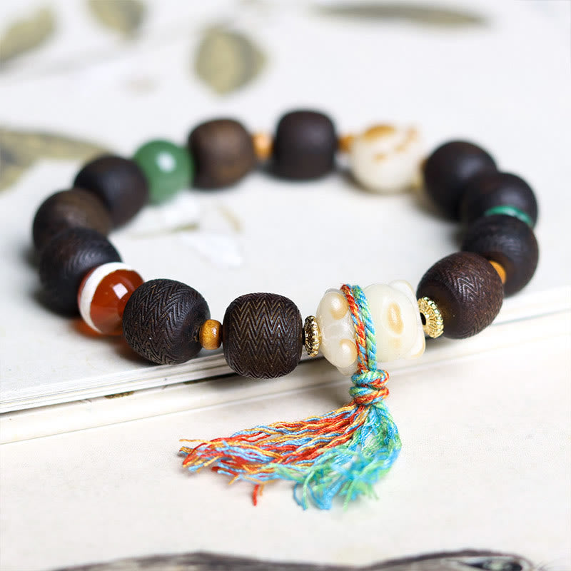 Bracelet de paix en bois d'agar de 12 mm avec breloque en graine de Bodhi