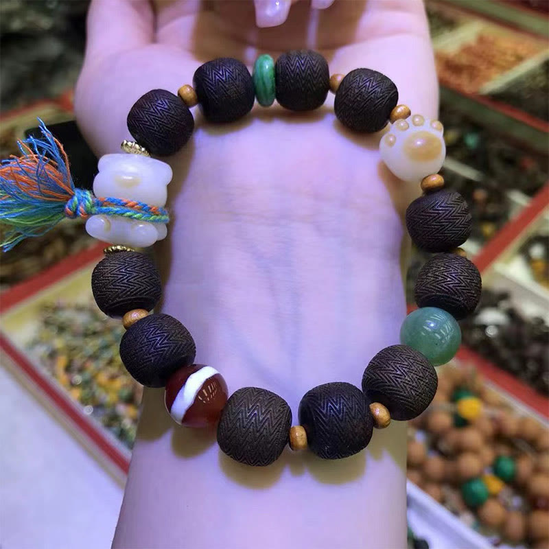 Bracelet de paix en bois d'agar de 12 mm avec breloque en graine de Bodhi