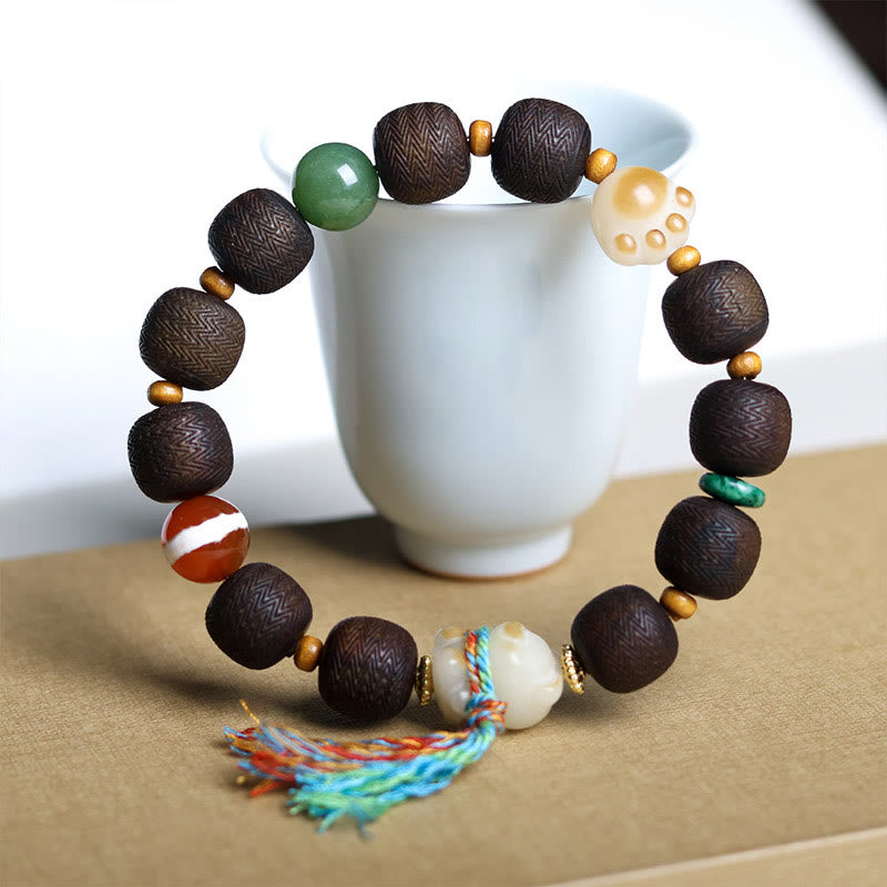 Bracelet de paix en bois d'agar de 12 mm avec breloque en graine de Bodhi