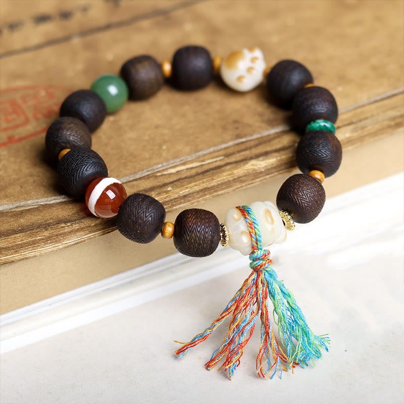 Bracelet de paix en bois d'agar de 12 mm avec breloque en graine de Bodhi