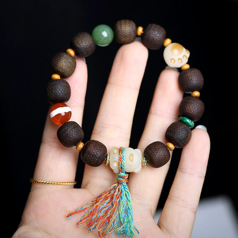 Bracelet de paix en bois d'agar de 12 mm avec breloque en graine de Bodhi