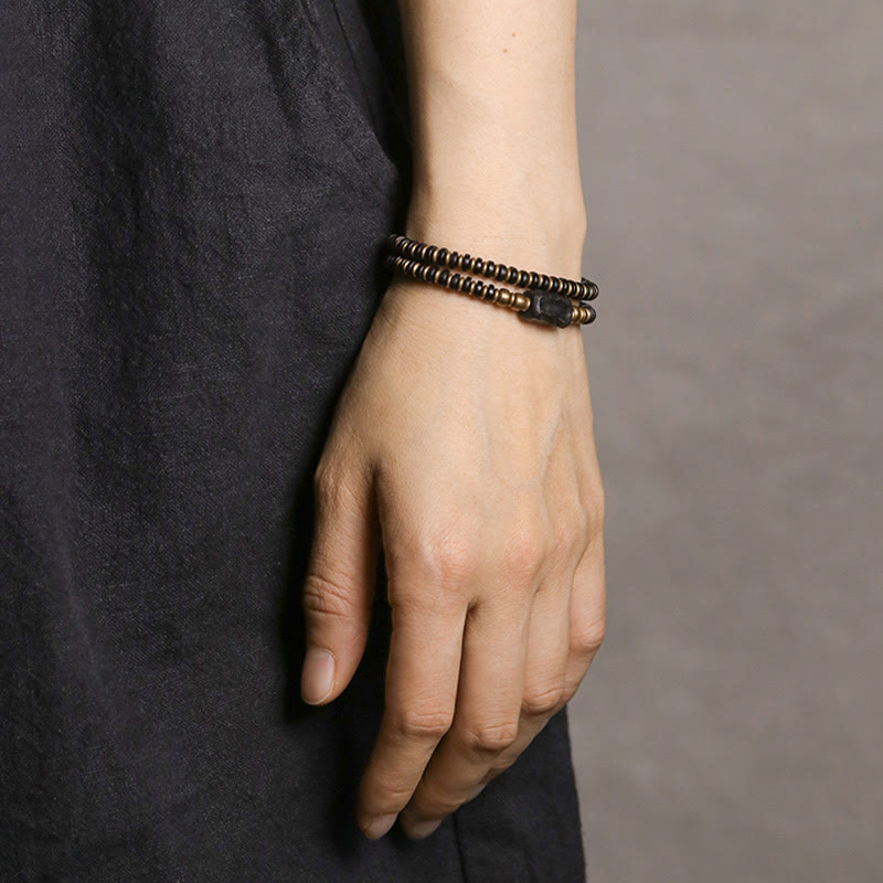 Bracelet double tour en bois d'ébène et bois de santal vert pour le calme