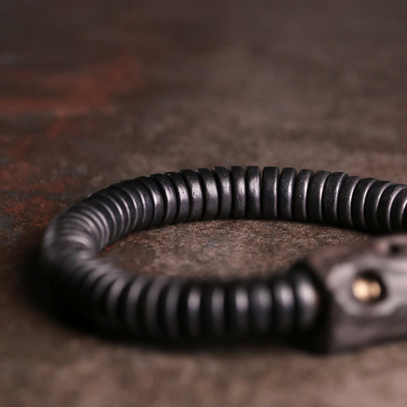 Bracelet d'équilibre classique en bois d'ébène troué de 8 mm pour la mise à la terre