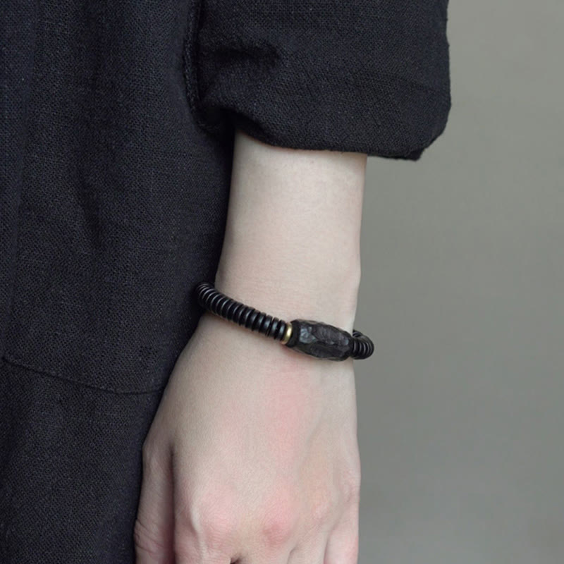 Bracelet d'équilibre classique en bois d'ébène troué de 8 mm pour la mise à la terre