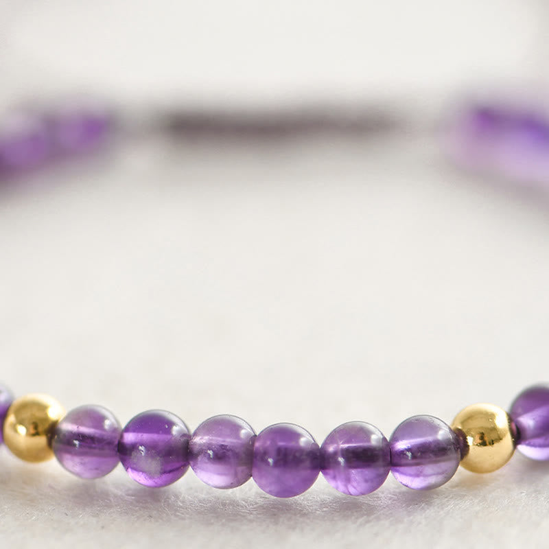 Bracelet anti-stress plaqué or et améthyste de 4 mm