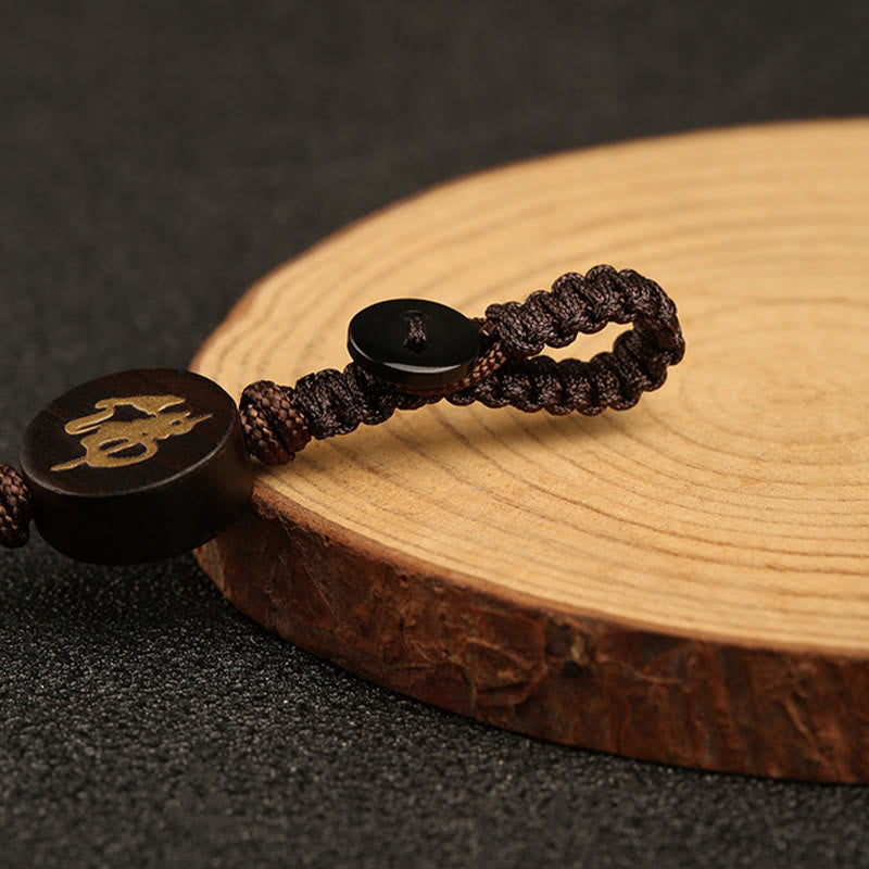 Porte-clés de protection Bouddha en bois de santal rouge à petites feuilles