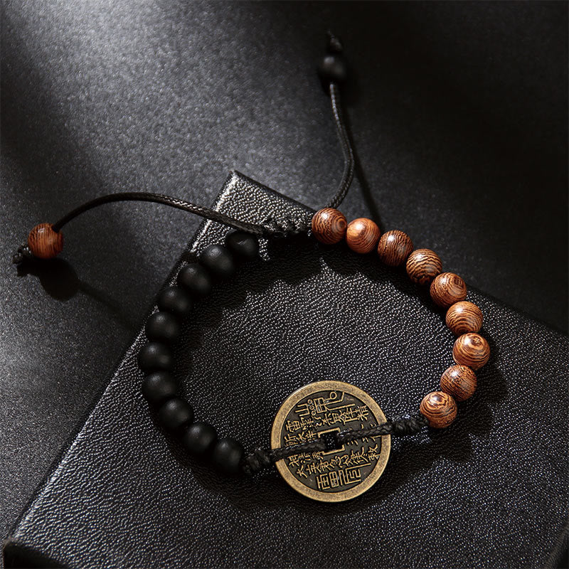 Bracelet de protection en bois d'ébène et pièces de cuivre Bagua