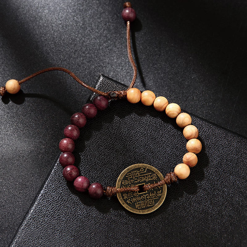 Bracelet de protection en bois d'ébène et pièces de cuivre Bagua