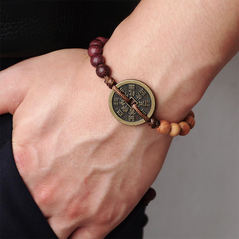 Bracelet de protection en bois d'ébène et pièces de cuivre Bagua