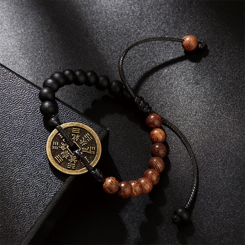 Bracelet de protection en bois d'ébène et pièces de cuivre Bagua
