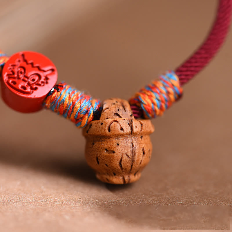 Chinese Zodiac Red String Peach Pit Cinnabar Luck Bracelet