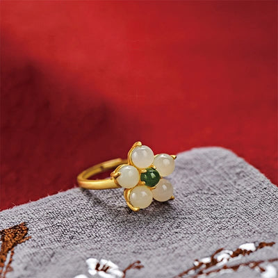 Bague ajustable en jade Hetian en forme de fleur de pêcher