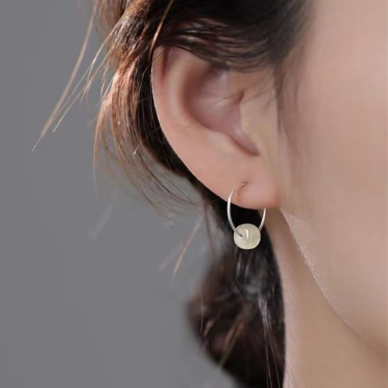 Sterling Silver Hetian Jade Earrings with Lucky Charm