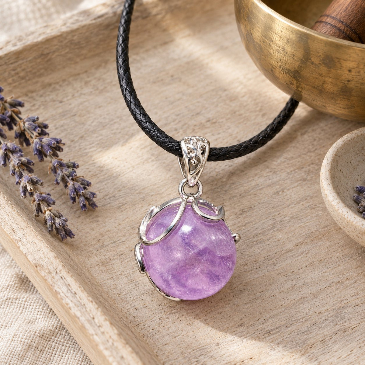 20mm Amethyst Pendant for Spiritual Healing & Meditation, styled with a singing bowl and lavender