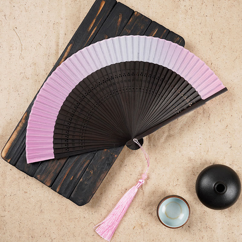 Éventail pliable en bambou de 21,5 cm avec motif gravé creux dégradé
