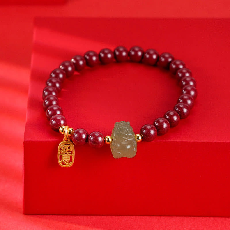Sterling Silver Dragon Bracelet with Cinnabar & Jade Charms