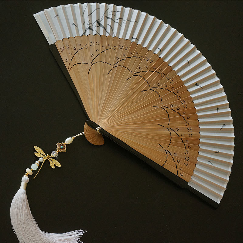 Éventail à main en bambou libellule de 22 cm avec pompon et motif buis