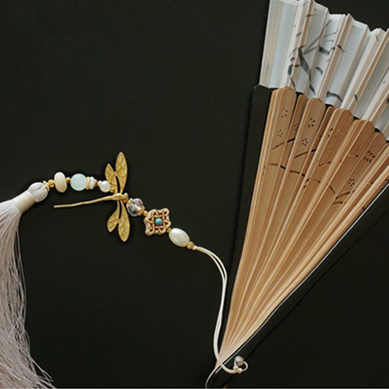 Éventail à main en bambou libellule de 22 cm avec pompon et motif buis