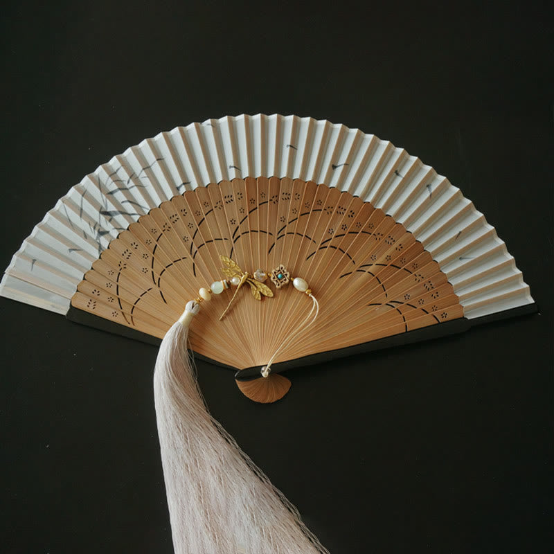 Éventail à main en bambou libellule de 22 cm avec pompon et motif buis
