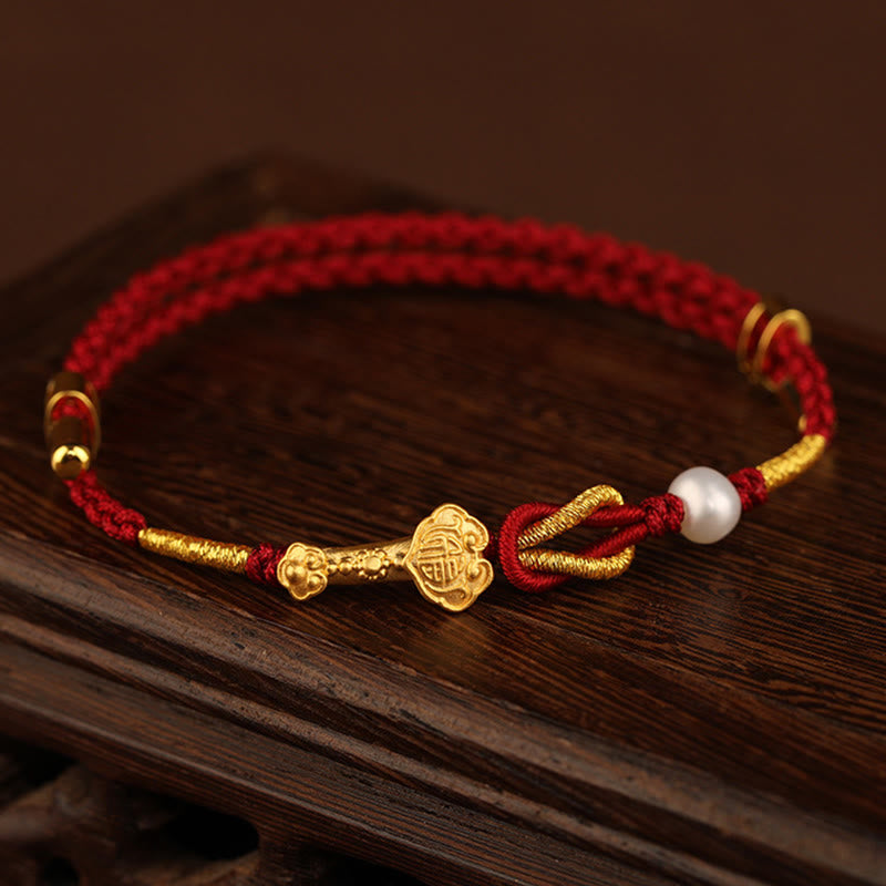 Bracelet porte-bonheur en or 24 carats avec fil rouge