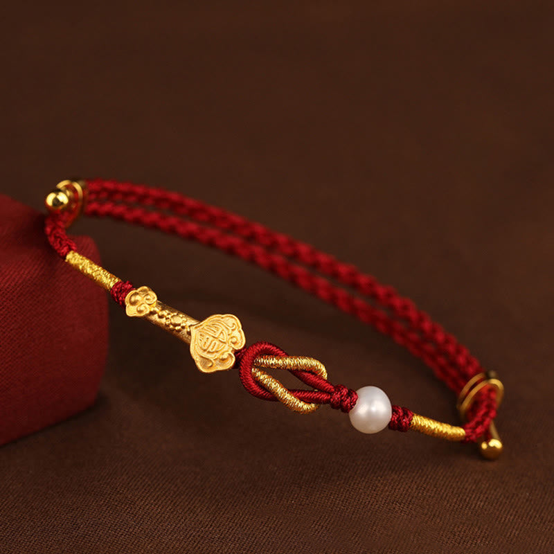 Bracelet porte-bonheur en or 24 carats avec fil rouge