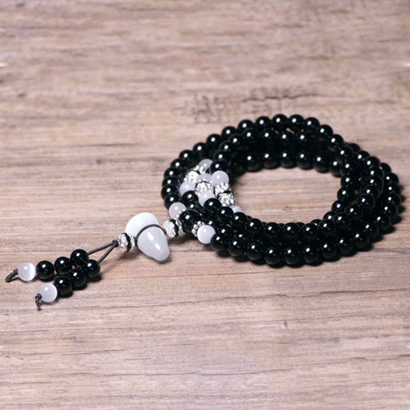 Bracelet de méditation en onyx noir et quartz clair de 6 mm