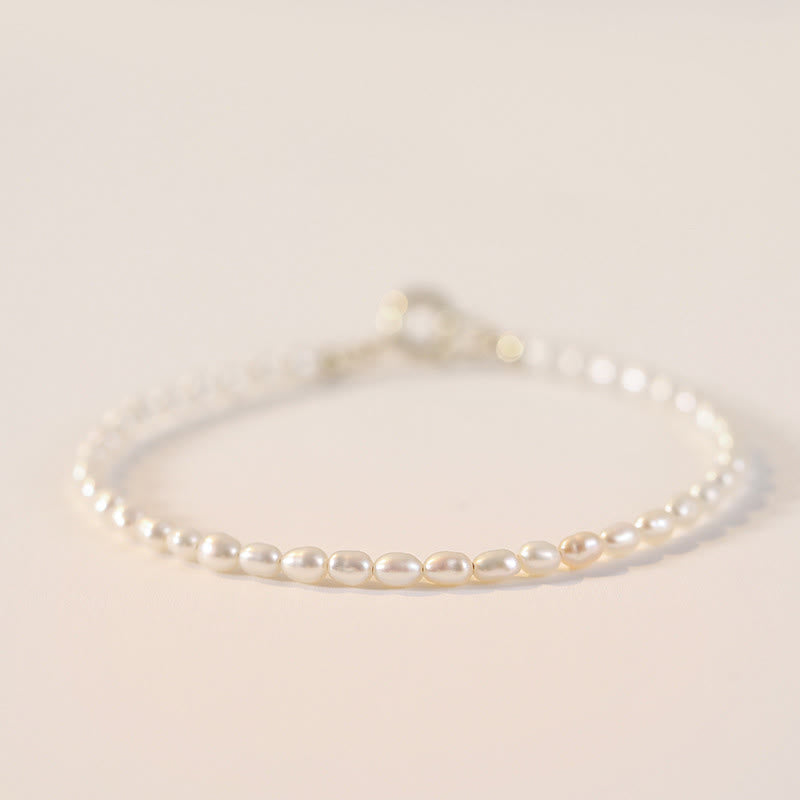 Bracelet Sagesse en perles naturelles de 2 mm et plaqué or 14 carats