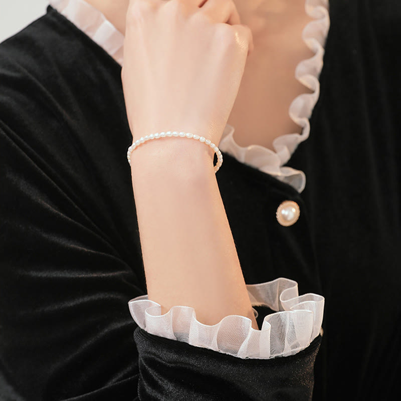 Bracelet Sagesse en perles naturelles de 2 mm et plaqué or 14 carats
