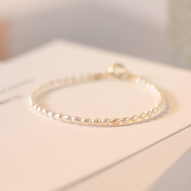 Bracelet Sagesse en perles naturelles de 2 mm et plaqué or 14 carats