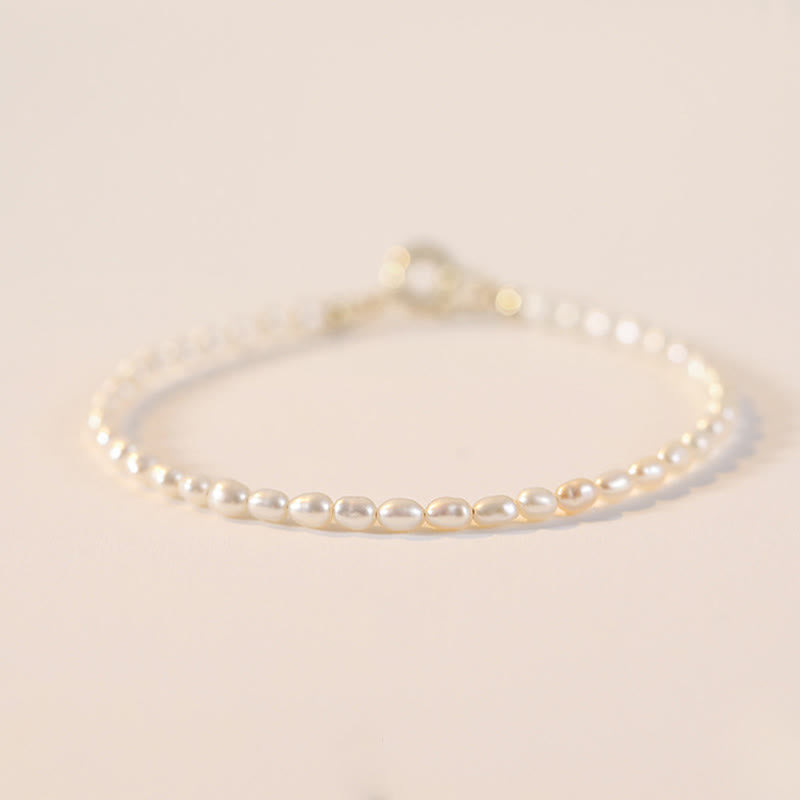 Bracelet Sagesse en perles naturelles de 2 mm et plaqué or 14 carats