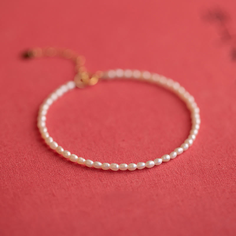 Bracelet Sagesse en perles naturelles de 2 mm et plaqué or 14 carats