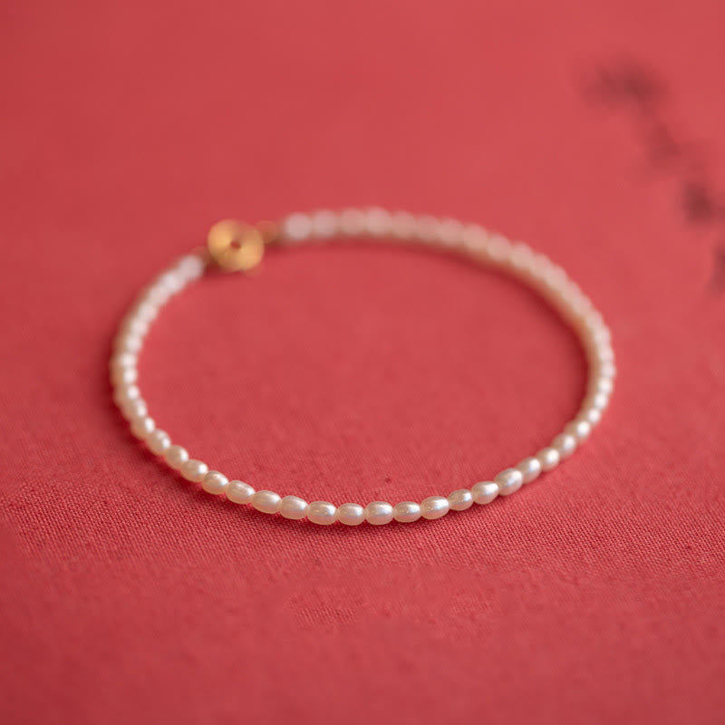 Bracelet Sagesse en perles naturelles de 2 mm et plaqué or 14 carats