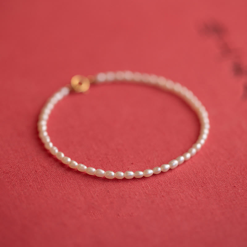 Bracelet Sagesse en perles naturelles de 2 mm et plaqué or 14 carats